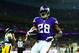 LONDON, ENGLAND - SEPTEMBER 29: Running back Adrian Peterson #28 of the Minnesota Vikings scores a touchdown during the NFL International Series game between Pittsburgh Steelers and Minnesota Vikings at Wembley Stadium on September 29, 2013 in London, En