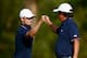 DUBLIN, OH - OCTOBER 03: Zach Johnson (L) and Jason Dufner of the U.S. Team celebrate a birdie on the ninth hole during the Day One Four-Ball Matches at the Muirfield Village Golf Club on October 3, 2013 in Dublin, Ohio. (Photo by Matt Sullivan/Getty I