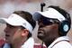 COLLEGE STATION, TX - AUGUST 31: Texas A&M Aggies head coach Kevin Sumlin waits with his quarterback Johnny Manziel #2 near the bench during the second quarter of the game against the Rice Owls at Kyle Field on August 31, 2013 in College Station, Texas.