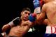 SHEFFIELD, ENGLAND - APRIL 27: Amir Khan in action against Julio Diaz at Motorpoint Arena on April 27, 2013 in Sheffield, England. (Photo by Scott Heavey/Getty Images)