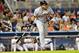 Sep 27, 2013; Miami, FL, USA; Detroit Tigers third baseman Miguel Cabrera (24) connects for a base hit during the fourth inning against the Miami Marlins at Marlins Park. Mandatory Credit: Steve Mitchell-USA TODAY Sports