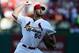 Oct 3, 2013; St. Louis, MO, USA; St. Louis Cardinals starting pitcher Adam Wainwright (50) throws to a Pittsburgh Pirates batter during the second inning in game one of the National League divisional series playoff baseball game at Busch Stadium. Mandator
