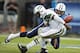 NASHVILLE, TN - SEPTEMBER 29: Karl Klug #97 of the Tennessee Titans strips the ball loose from Geno Smith #7 of the New York Jets at LP Field on September 29, 2013 in Nashville, Tennessee. The Titans defeated the Jets 38-13. (Photo by Wesley Hitt/Getty