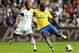SWANSEA, WALES - SEPTEMBER 28: Bacary Sagna of Arsenal (R) in action with Wayne Routledge of Swansea during the Barclays Premier League match between Swansea City and Arsenal at Liberty Stadium on September 28, 2013 in Swansea, Wales. (Photo by Scott He