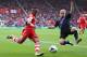 SOUTHAMPTON, ENGLAND - SEPTEMBER 28: Nathaniel Clyne of Southampton battles for the ball with Dean Moxey of Crystal Palace during the Barclays Premier League match between Southampton and Crystal Palace at St Mary's Stadium on September 28, 2013 in South