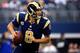 ARLINGTON, TX - SEPTEMBER 22: Quarterback Sam Bradford #8 of the St. Louis Rams in action during the game against the Dallas Cowboys at AT&T Stadium on September 22, 2013 in Arlington, Texas. (Photo by Jamie Squire/Getty Images)