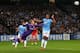 MANCHESTER, ENGLAND - OCTOBER 02: Joe Hart of Manchester City punches clear as Vincent Kompany of Manchester City avoids a collision during the UEFA Champions League Group D match between Manchester City and FC Bayern Muenchen at Etihad Stadium on Octobe