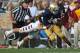 SOUTH BEND, IN - AUGUST 31: George Atkinson III #4 of the Notre Dame Fighting Irish breaks away from Blaze Caponegro #6 of the Temple Owls at Notre Dame Stadium on August 31, 2013 in South Bend, Indiana. Notre Dame defeated Temple 28-6. (Photo by Jonathan