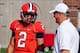 Sep 7, 2013; Champaign, IL, USA; Illinois Fighting Illini quarterback Nathan Scheelhaase (2) talks with offensive coordinator Bill Cubit (right) before the game against the Cincinnati Bearcats at Memorial Stadium. Mandatory Credit: Bradley Leeb-USA TODAY