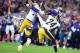 Sep 29, 2013; London, UNITED KINGDOM; Minnesota Vikings wide receiver Jerome Simpson (81) is tackled by Pittsburgh Steelers cornerback Ike Taylor (24) and free safety Ryan Clark (25) during the NFL International Series game at Wembley Stadium. Mandatory C