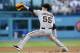 LOS ANGELES, CA - SEPTEMBER 14: Tim Lincecum #55 of the San Francisco Giants throws a pitch against the Los Angeles Dodgers at Dodger Stadium on September 14, 2013 in Los Angeles, California. (Photo by Stephen Dunn/Getty Images)