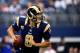 ARLINGTON, TX - SEPTEMBER 22: Quarterback Sam Bradford #8 of the St. Louis Rams in action during the game against the Dallas Cowboys at AT&T Stadium on September 22, 2013 in Arlington, Texas. (Photo by Jamie Squire/Getty Images)