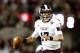 TUSCALOOSA, AL - OCTOBER 27: Tyler Russell #17 of the Mississippi State Bulldogs scrambles from the Alabama Crimson Tide defense at Bryant-Denny Stadium on October 27, 2012 in Tuscaloosa, Alabama. (Photo by Kevin C. Cox/Getty Images)
