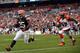 CLEVELAND, OH - SEPTEMBER 29: Fullback Chris Ogbonnaya #25 of the Cleveland Browns scores a touchdown in front of linebacker Vincent Rey #57 of the Cincinnati Bengals at FirstEnergy Stadium on September 29, 2013 in Cleveland, Ohio. (Photo by Matt Sulliv