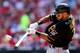 ST LOUIS, MO - OCTOBER 04: Pedro Alvarez #24 of the Pittsburgh Pirates hits a two-run home run in the third inning against the St. Louis Cardinals during Game Two of the National League Division Series at Busch Stadium on October 4, 2013 in St Louis, Mis