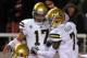SALT LAKE CITY UT - OCTOBER 3: Quarterback Brett Hundley #17 of UCLA celebrates with teammates Devin Fuller #7 and Jordan Payton #9 after his game deciding 4th quarter touchdown at Rice- Eccles Stadium October 3, 2013 in Salt Lake City, Utah. UCLA took t