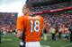 DENVER, CO - SEPTEMBER 29: Quarterback Peyton Manning #18 of the Denver Broncos walks off of the field after the win over the Philadelphia Eagles at Sports Authority Field Field at Mile High on September 29, 2013 in Denver, Colorado. (Photo by Dustin Br