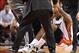 Jun 19 2012; Miami, FL, USA; Miami Heat small forward LeBron James (6) is helped to his feet after an injury against the Oklahoma City Thunder during the fourth quarter of game four in the 2012 NBA Finals at the American Airlines Arena. Mandatory Credit: