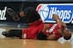 DENVER, CO - JANUARY 13: Dwyane Wade #3 of the Miami Heat falls to the court with an injury in the fourth quarter against the Denver Nuggets at the Pepsi Center on January 13, 2012 in Denver, Colorado. Wade left the game after the injury as the Nuggets d