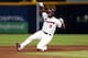 ATLANTA, GA - SEPTEMBER 28: Right fielder Justin Upton #8 of the Atlanta Braves slides into second base for a double during the game against the Philadelphia Phillies at Turner Field on September 28, 2013 in Atlanta, Georgia. (Photo by Mike Zarrilli/Get