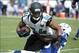 Sep 29, 2013; Jacksonville, FL, USA; Jacksonville Jaguars wide receiver Cecil Shorts III (84) is tackled by Indianapolis Colts cornerback Vontae Davis (23) during the second half of the game against the Jacksonville Jaguars at EverBank Field. Mandatory C