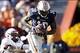 Nov 17, 2012; Auburn, AL, USA: Auburn Tigers receiver Sammie Coates (18) catches a touchdown pass as Alabama A&M Bulldogs defensive back Derrick Harris (21) applies pressure during the second half at Jordan-Hare Stadium. Mandatory Credit: John Reed-USA T