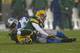 GREEN BAY, WI - DECEMBER 09: Aaron Rodgers #12 of the Green Bay Packers is thrown to the ground by Cliff Avril #92 the Detroit Lions at Lambeau Field on December 9, 2012 in Green Bay, Wisconsin. The Packers defeated the Lions 27-20. (Photo by Jonathan Da