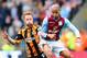 HULL, ENGLAND - OCTOBER 05: Stephen Quinn of Hull City battles with Karim El Ahmadi of Aston Villa during the Barclays Premier League match between Hull City and Aston Villa at KC Stadium on October 5, 2013 in Hull, England. (Photo by Julian Finney/Gett