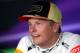 SINGAPORE - SEPTEMBER 22: Third placed Kimi Raikkonen of Finland and Lotus speaks to the media following the Singapore Formula One Grand Prix at Marina Bay Street Circuit on September 22, 2013 in Singapore, Singapore. (Photo by Mark Thompson/Getty Image