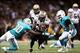 Sep 30, 2013; New Orleans, LA, USA; New Orleans Saints running back Darren Sproles (43) carries the ball between Miami Dolphins strong safety Chris Clemons (30) and middle linebacker Dannell Ellerbe (59) in the second half at Mercedes-Benz Superdome. New