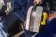 ANN ARBOR, MI - NOVEMBER 10: A Michigan Wolverine student holds the Little Brown Jug during the Big Ten Conference football game against the Minnesota Golden Gophers on November 10, 2001 at Michigan Stadium in Ann Arbor, Michigan. Michigan defeated Minn