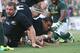 JOHANNESBURG, SOUTH AFRICA - OCTOBER 05: Liam Messam of the All Blacks dives over for a try during the Rugby Championship match between South Africa Springboks and the New Zealand All Blacks at Ellis Park on October 5, 2013 in Johannesburg, South Africa.