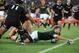 JOHANNESBURG, SOUTH AFRICA - OCTOBER 05: Willie le Roux of South Africa dives over for his try during The Rugby Championship match between South Africa and New Zealand at Ellis Park on October 05, 2013 in Johannesburg, South Africa. (Photo by Duif du Toit