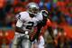 DENVER, CO - SEPTEMBER 23: Terrelle Pryor #2 of the Oakland Raiders scrambles against the Denver Broncos at Sports Authority Field at Mile High on September 23, 2013 in Denver, Colorado. (Photo by Justin Edmonds/Getty Images)