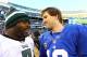 EAST RUTHERFORD, NJ - DECEMBER 30: Eli Manning #10 of the New York Giants speaks with Michael Vick #7 of the Philadelphia Eagles after the Giants 42-7 win at MetLife Stadium on December 30, 2012 in East Rutherford, New Jersey. (Photo by Al Bello/Getty