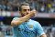 MANCHESTER, ENGLAND - OCTOBER 05: Alvaro Negredo of Manchester City celebrates after scoring to level the scores at 1-1 during the Barclays Premier League match between Manchester City and Everton at Etihad Stadium on October 5, 2013 in Manchester, Engla