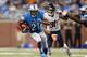 DETROIT, MI - SEPTEMBER 29: Reggie Bush #21 of the Detroit Lions runs away from Isaiah Frey #31 of the Chicago Bears for a second-quarter touchdown at Ford Field on September 29, 2013 in Detroit, Michigan. (Photo by Gregory Shamus/Getty Images)