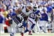 Sep 8, 2013; Orchard Park, NY, USA; New England Patriots wide receiver Danny Amendola (80) runs after a catch as Buffalo Bills cornerback Leodis McKelvin (21) pursues during the second half at Ralph Wilson Stadium. Patriots beat the Bills 23-21. Mandatory