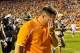 Oct 5, 2013; Knoxville, TN, USA; Tennessee Volunteers head coach Butch Jones wipes his forehead as he leaves the field after being defeated in overtime 34-31 by the Georgia Bulldogs at Neyland Stadium. Mandatory Credit: Jim Brown-USA TODAY Sports