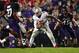 Oct 5, 2013; Evanston, IL, USA; Ohio State Buckeyes quarterback Braxton Miller (5) runs past Northwestern Wildcats linebacker Collin Ellis (45) during the second quarter at Ryan Field. Mandatory Credit: Jerry Lai-USA TODAY Sports