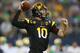 ARLINGTON, TX - OCTOBER 05: Taylor Kelly #10 of the Arizona State Sun Devils throws the ball against the Notre Dame Fighting Irish at Cowboys Stadium on October 5, 2013 in Arlington, Texas. (Photo by Ronald Martinez/Getty Images)