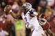 NORMAN, OK - OCTOBER 5: Trevone Boykin #2 of the TCU Horned Frogs is hit while trying to pass during a game against the Oklahoma Sooners at Gaylord Family Oklahoma Memorial Stadium on October 5, 2013 in Norman, Oklahoma. The Sooners defeated the Horned