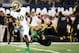 Oct 5, 2013; Arlington, TX, USA; Arizona State Sun Devils safety Alden Darby (4) attempts to tackle Notre Dame Fighting Irish wide receiver DaVaris Daniels (10) in the second quarter at AT&T Stadium. Mandatory Credit: Matt Cashore-USA TODAY Sports