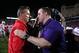 Oct 5, 2013; Evanston, IL, USA; Northwestern Wildcats head coach Pat Fitzgerlad (right) greets Ohio State Buckeyes head coach Urban Meyer (left) after the game at Ryan Field. Ohio State won 40-30. Mandatory Credit: Jerry Lai-USA TODAY Sports