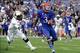 Oct 5, 2013; Lawrence, KS, USA; Kansas Jayhawks running back Tony Pierson (3) runs after a catch against Texas Tech Red Raiders defensive back J.J. Gaines (3) in the first half at Memorial Stadium. Mandatory Credit: John Rieger-USA TODAY Sports