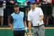 Oct 6, 2013; Dublin, OH, USA; Adam Scott and Bill Haas watch Haas's drive on the 1st tee during the fourth round of the Presidents Cup at Muirfield Village Golf Club. Mandatory Credit: Peter Casey-USA TODAY Sports