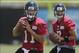 July 27, 2012; Jacksonville FL, USA; Jacksonville Jaguars quarterback Blaine Gabbert (11) and quarterback Chad Henne (7) during the first afternoon of training camp practice at Florida Blue Health & Wellness Practice Fields. Mandatory Credit: Phil Sears-
