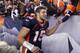 DENVER, CO - JANUARY 08: Quarterback Tim Tebow #15 of the Denver Broncos receives high fives from fans after defeating the Pittsburgh Steelers in overtime of the AFC Wild Card Playoff game at Sports Authority Field at Mile High on January 8, 2012 in Denv