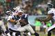 PHILADELPHIA, PA - AUGUST 09: LeGarrette Blount #29 of the New England Patriots carries the ball as Jake Knott #54 of the Philadelphia Eagles defends on August 9, 2013 at Lincoln Financial Field in Philadelphia, Pennslyvania. (Photo by Elsa/Getty Image