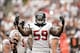 Sep 15, 2013; Houston, TX, USA; Houston Texans outside linebacker Whitney Mercilus (59) pumps up the crowd against the Tennessee Titans during the first half at Reliant Stadium. Mandatory Credit: Thomas Campbell-USA TODAY Sports